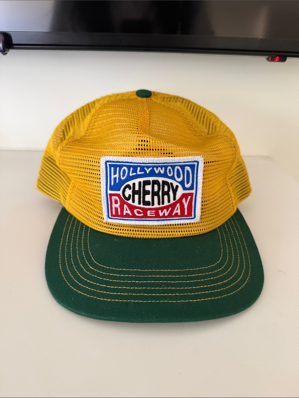 Cherry LA Yellow Mesh Trucker Hat with Green Brim